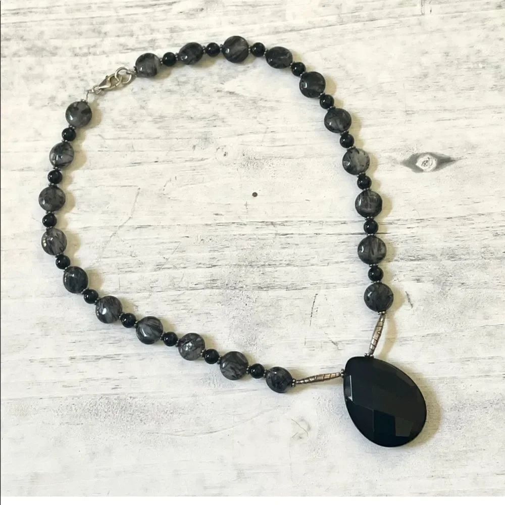 Black and grey beaded pendant necklace